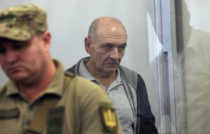 Volodymyr Tsemakh, former commander of Russian-backed separatist forces in eastern Ukraine, sits in a court room in Kiev, Ukraine, Thursday Sept. 5, 2019.