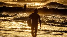 Surfer take advantage of the 5-7 foot wave