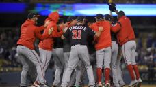 Washington Nationals celebrate after their 7-3 win in