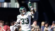 Jets safety Jamal Adams celebrates after he intercepted