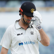 Heading for trouble: Warriors captain Mitchell Marsh walks off after being dismissed by Jackson Bird of the Tigers on day four of the Sheffield Shield match at the WACA.