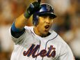 The Mets' Calros Beltran celebrates his walk off