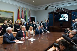 President Donald J. Trump, joined by Vice President Mike Pence, Presidential Advisor Ivanka Trump, and NASA Administrator Jim Bridenstine, talks via video tele-conference with NASA astronauts Jessica Meir and Christina Koch during the first all-women’s spacewalk Friday, Oct. 18, 2019, from the Roosevelt Room of the White House.