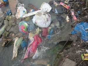 File - Plastic rubbish on the street in in Tondo Manila, Philippines.