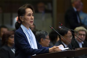 Myanmar's leader Aung San Suu Kyi addresses judges of the International Court of Justice for the second day of three days of hearings in The Hague, Netherlands, Wednesday, Dec. 11, 2019