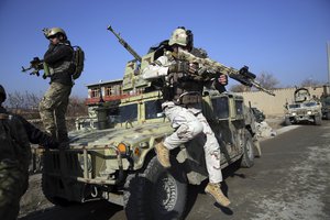 Security personnel arrive near the site of an attack near the Bagram Air Base In Parwan province of Kabul, Afghanistan, Wednesday, Dec. 11, 2019