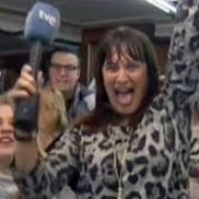 Spanish reporter Natalia Escudero celebrates her El Gordo win on live TV.