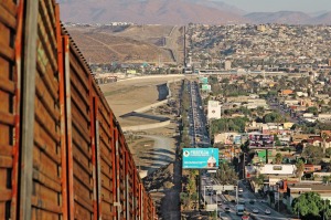 A border fence between the US and Mexico.