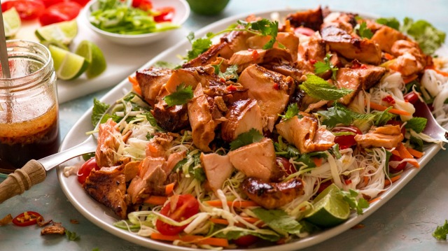 The dressing (left) does double duty as a marinade for this flaked, glazed salmon.