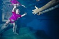 Water safe ... Children can start a structured swimming program, accompanied by a parent, as young as four months.