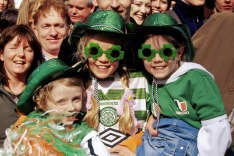 Kids get into the festival spirit while waiting for the St Patrick's Day parade in Dublin.