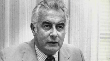 P.M. Gough Whitlam papers his statement for Parliament in his office at Parliament House Canberra. The Prime Minister, Mr Whitlam, will face perhaps the stormiest test of his political career when he returns from his 39-day tour on Tuesday. November 12, 1974. (Photo by Peter Wells, Canberra Times).