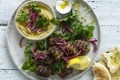 Neil Perry's lamb meatballs with onion salad and hummus.