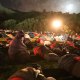 People wait for the Dawn Service ceremony at the Anzac Cove beach, the site of World War I landing of the ANZACs (Australian and New Zealand Army Corps) on April 25, 1915, in Gallipoli peninsula, Turkey, early Thursday, April 25, 2019. As dawn broke, families of soldiers, leaders and visitors gathered near former battlefields, honouring thousands of Australians and New Zealanders who fought in the Gallipoli campaign of World War I on the ill-fated British-led invasion. The doomed Allied offensive to secure a naval route from the Mediterranean to Istanbul through the Dardanelles, and take the Ottomans out of the war, resulted in over 130,000 deaths on both sides.(AP Photo/Emrah Gurel)