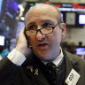 Wall Street dives despite Fed's emergency rate cut