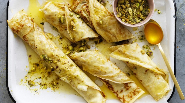 Baklava-ish honey and pistachio filled crepes.