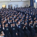 Hundreds of students at their "passover" in Australia last year, where they cheered and applauded speakers including Lee Man-Hee.