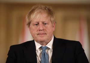 British Prime Minister Boris Johnson gives a press conference about the ongoing situation with the COVID-19 coronavirus outbreak inside 10 Downing Street in London, Tuesday, March 17, 2020