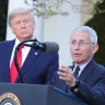 Anthony Fauci, director of the National Institute of Allergy and Infectious Diseases, right, helped make the case for a longer shutdown to US President Donald Trump.