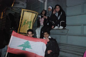 Anti-Israel demonstrators in Oslo with Hezbollah and Lebanese flags