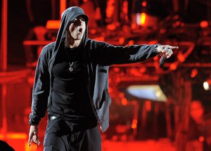 Eminem performs onstage during Dr. Dre and Snoop Dogg's headlining performance on the first weekend of the 2012 Coachella Valley Music and Arts Festival, Sunday, April 15, 2012, in Indio, Calif.