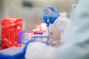 Pennsylvania Commonwealth microbiologist Kerry Pollard performs a manual extraction of the coronavirus inside the extraction lab at the Pennsylvania Department of Health Bureau of Laboratories on Friday, March 6, 2020