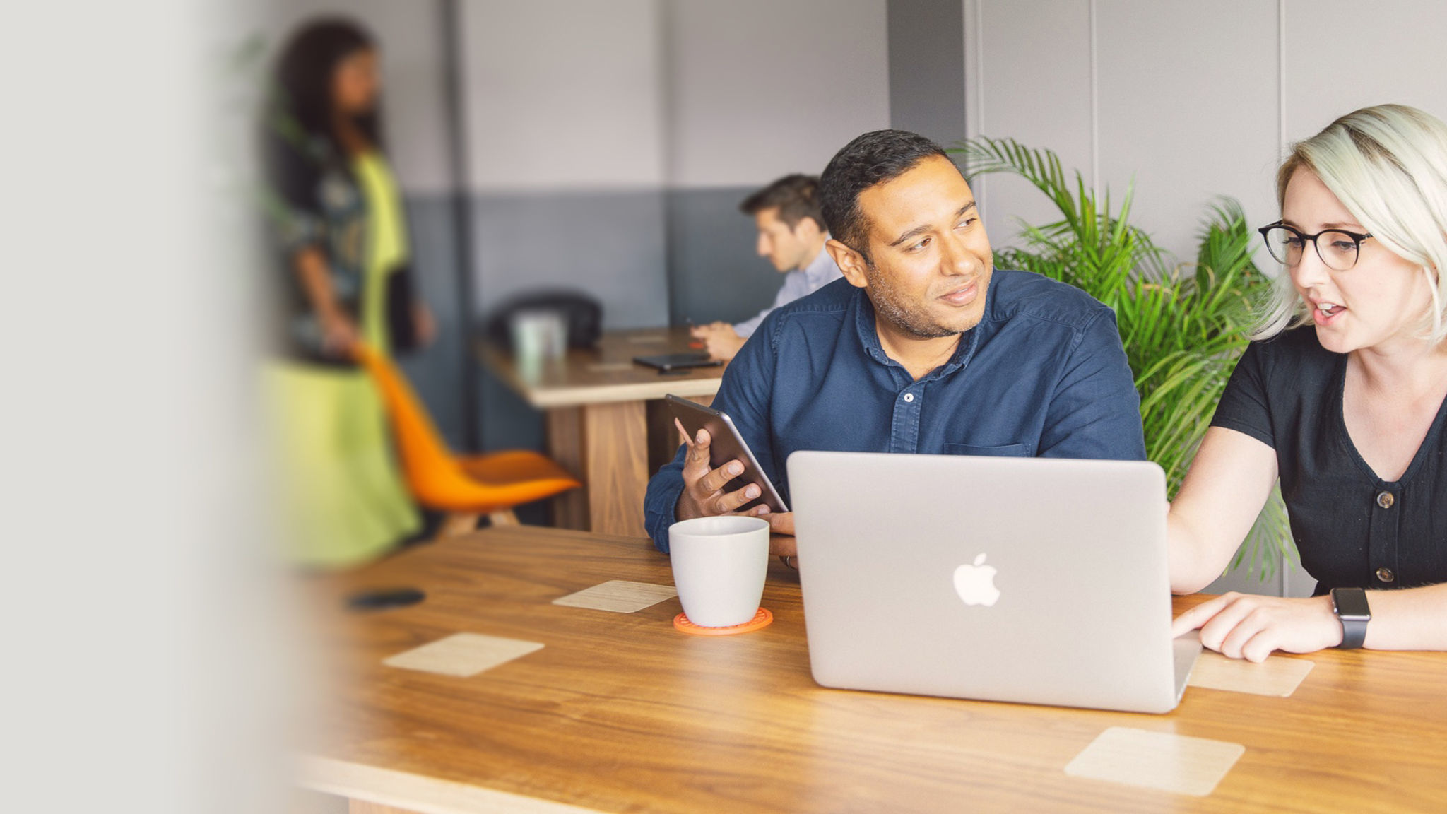 two-people-discussing-work