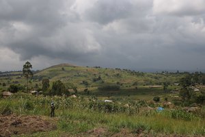 Ituri Province, DR Congo - A blue helmet observes the surroundings from the heights of Gety