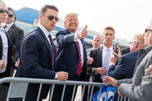 File - President Donald J. Trump disembarks Air Force Two Monday, Oct. 28, 2019, at O’Hare International Airport in Chicago and is met by supporters.