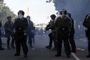 Police clear demonstrators from Lafayette Park as they protest the death of George Floyd, Monday, June 1, 2020, in Washington. Floyd died after being restrained by Minneapolis police officers.