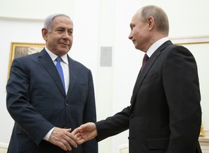 File - Russian President Vladimir Putin, right, shakes hands with Israeli Prime Minister Benjamin Netanyahu during their meeting in the Kremlin in Moscow, Russia, Thursday, April 4, 2019.