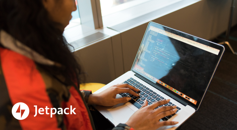 Jetpack CDN controls and customization - coder at laptop