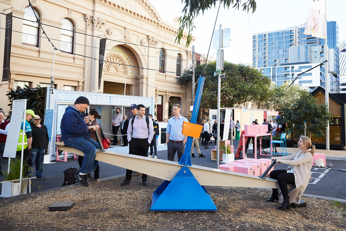 Adults on see-saw