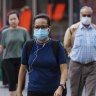 Members of the public in Sydney wearing face masks. 