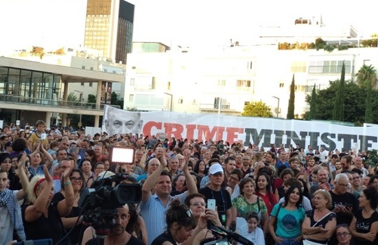 Head of the Joint List, MK Ayman Odeh (Hadash), center in blue shirt with arms raised, was among the participants in the protest Arabic lesson in Tel Aviv, Monday, July 30.