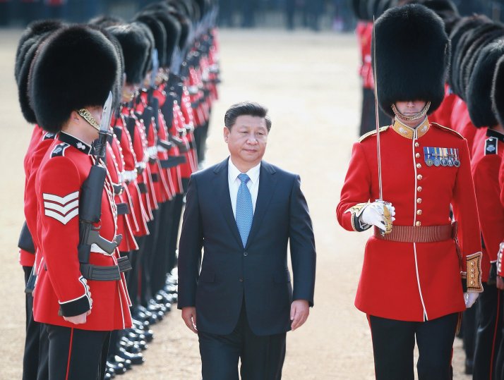 Chinese president Xi Jinping inspects the guard of honour on Horse Guards Parade in central London on October 20, 2015.