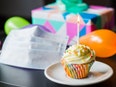 A birthday cupcake and face mask