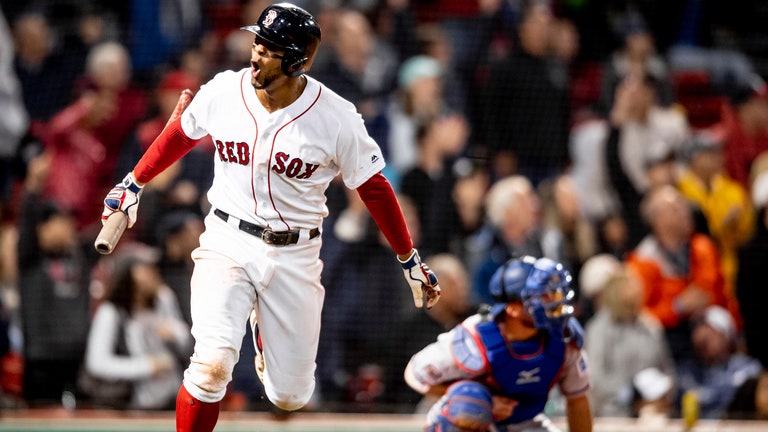 Xander Bogaerts celebrating after hitting a home run