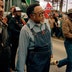 Rev. Hosea Williams leading a march with white supremacist counter-protesters in the background