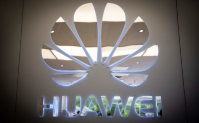 A Huawei logo is displayed in a store in Beijing on May 21, 2019.