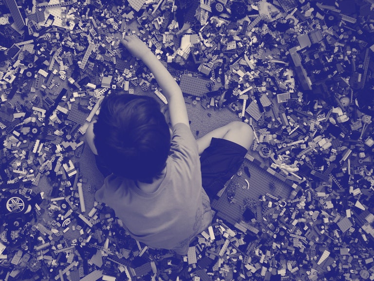 A child playing with Legos