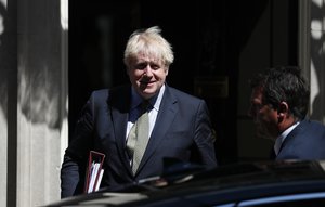 Britain's Prime Minister Boris Johnson leaves 10 Downing Street for the House of Commons for his weekly Prime Minster's Questions in London, Wednesday, July 22, 2020.