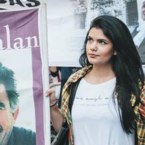 The face of Abdullah Öcalan frequently appears on banners at pro-Kurdish demonstrations around the world,  ​like this one in Berlin. Jan Scheunert/Zuma/Alamy