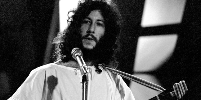 Image may contain: Human, Person, Peter Green, Face, Electrical Device, Microphone, Musician, Musical Instrument, and Hair