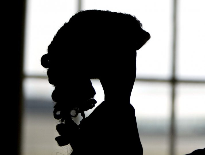 Barrister's wig silhouetted.