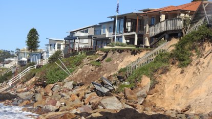 Coast-dwellers ordered to evacuate after 30m of beach washed away