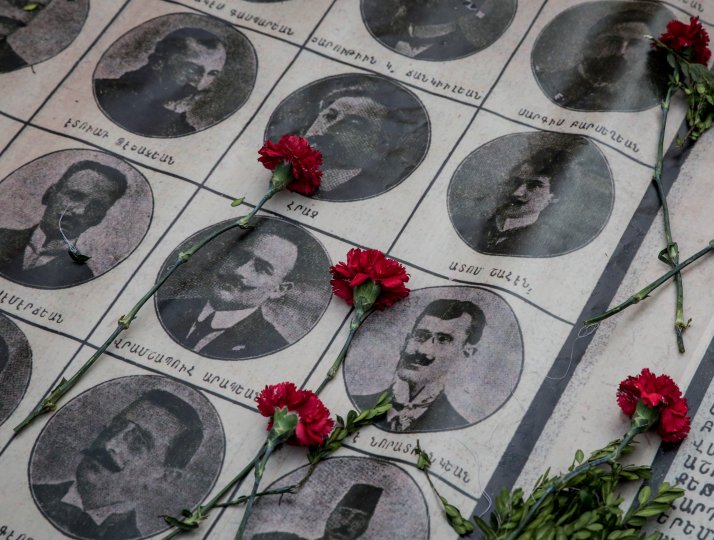  Roses are seen on the portraits of victims during a memorial to commemorate the 1915 Armenian genocide in Istanbul, Turkey.