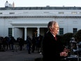 John Bolton in front of the White House.