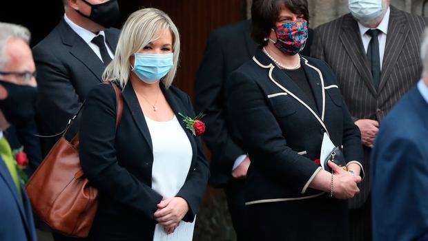 First Minister of Northern Ireland Arlene Foster (centre) and Deputy First Minister Michelle O'Neill (left) leave, following the funeral service of former SDLP leader John Hume, at St Eugene's Cathedral in Londonderry. PA Photo. Picture date: Wednesday August 5, 2020. Hume was a key architect of Northern Ireland's Good Friday Agreement and was awarded the Nobel Peace Prize for the pivotal role he played in ending the region's sectarian conflict. He died on Monday aged 83, having endured a long battle with dementia. See PA story FUNERAL Hume. Photo credit should read: Niall Carson/PA Wire 