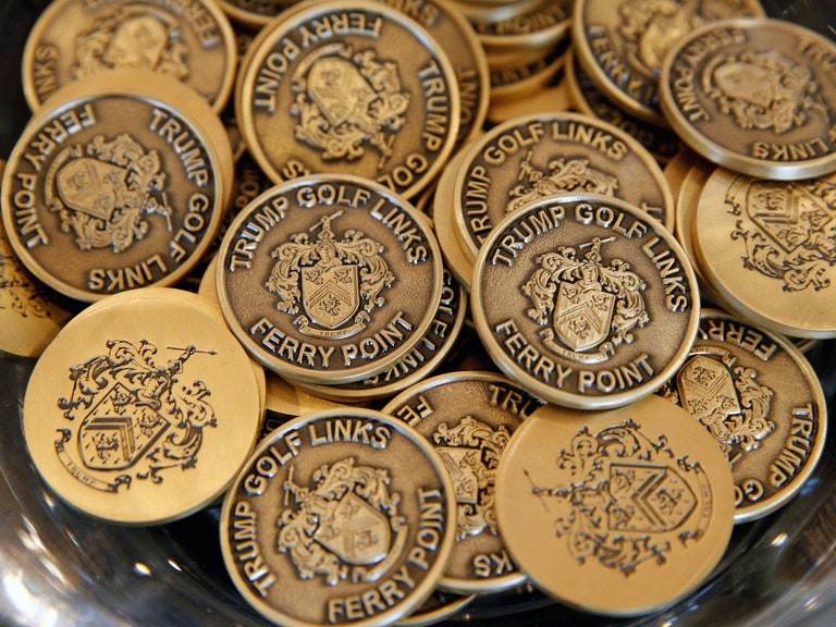 Ball markers are displayed for sale in the clubhouse at Trump Golf Links.